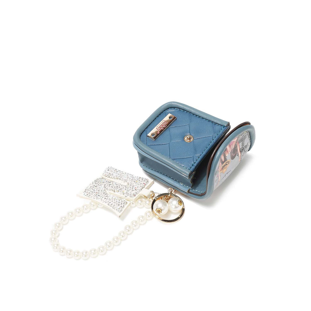 LLAVERO CON PORTAAUDÍFONOS Y PULSERA DE PERLAS NIKKY