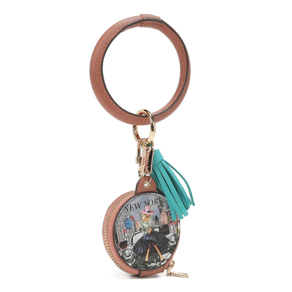 PULSERA CON LLAVERO Y PORTAAUDÍFONOS